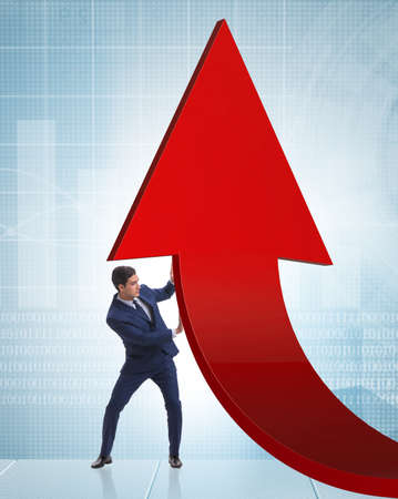 Businessman supporting growth in economy on chart graph
