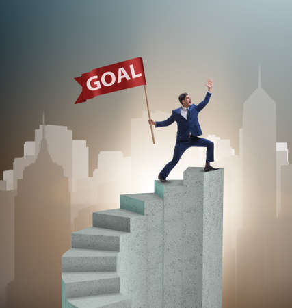 Businessman achieving his business goal objectiveの写真素材