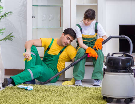 Cleaning professional contractors working at houseの写真素材