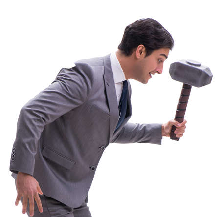 Businessman with hammer isolated on white backgroundの写真素材
