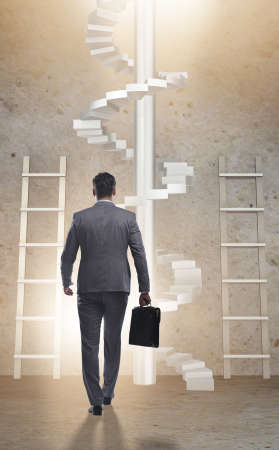 Career progression concept with ladders and staircaseの写真素材