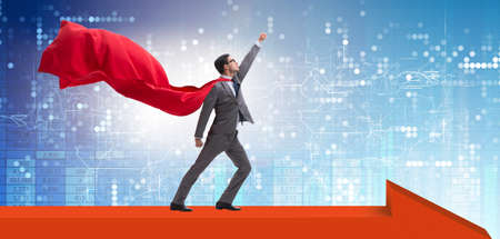 The superhero businessman standing on arrow