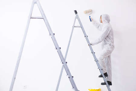 Painter working at construction siteの写真素材