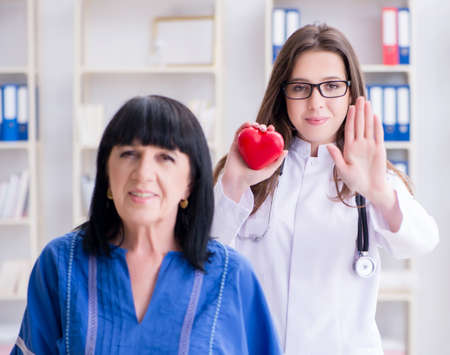 Senior patient visiting doctor for regular check-upの写真素材