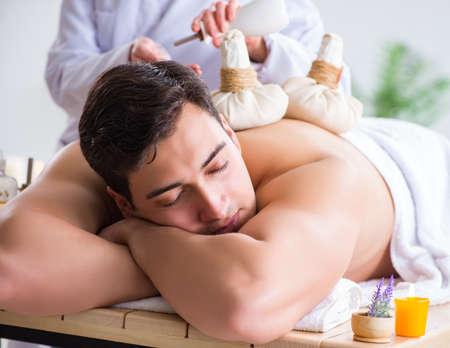 Man in spa enjoying his timeの写真素材