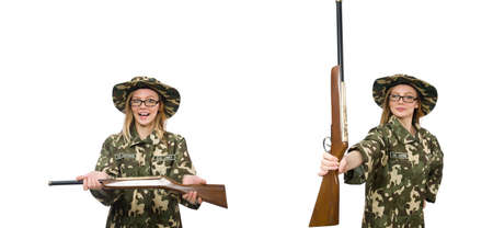 Girl in military uniform holding the gun isolated on white