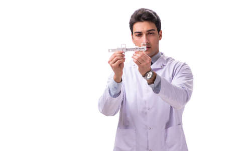 Young male doctor ophthalmologist isolated on whiteの写真素材