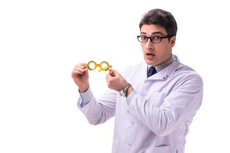 Young male doctor ophthalmologist isolated on whiteの写真素材