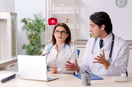 Two doctors working in the clinicの写真素材