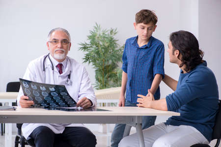 Young boy visiting doctor in hospitalの写真素材