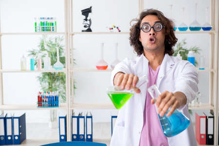 Funny male chemist working in the labの写真素材