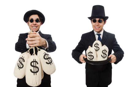 Young employee holding money bags isolated on whiteの写真素材