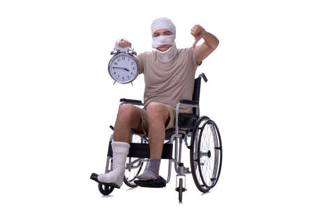 Injured man in wheel-chair isolated on white