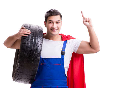 Superhero man with tyre isolated white backgroundの写真素材