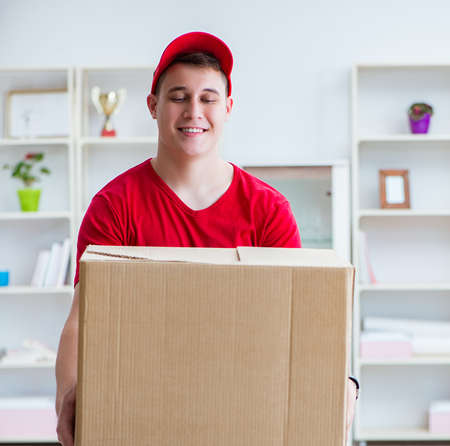 Post man delivering a parcel package