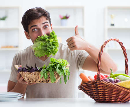 Young man in healthy eating and dieting conceptの写真素材