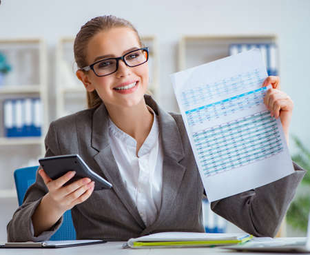 Young businesswoman accountant working in the officeの写真素材