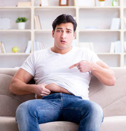 Man suffering from sick stomach and vomitingの写真素材