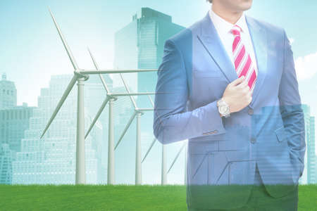 Green energy anc ecology concept with businessmanの写真素材