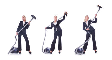 Businesswoman with vacuum cleaner on whiteの写真素材