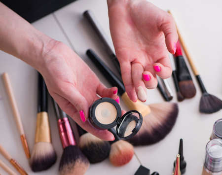 The collection of make up products displayed on the table