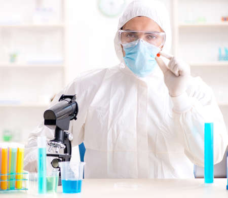 Lab assistant in drug synthesis concept