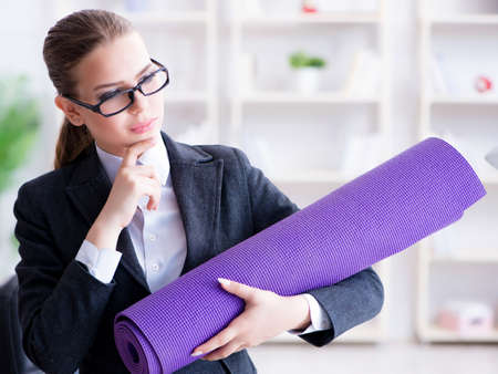 Young businesswoman in healthy lifestyle conceptの写真素材