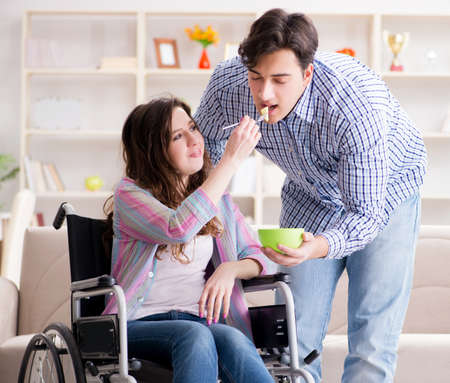 The young family taking care of each otherの写真素材