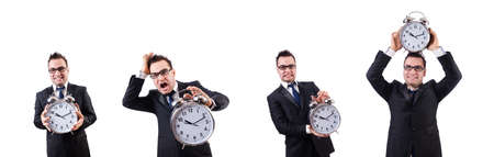 Man with alarm clock isolated on whiteの写真素材