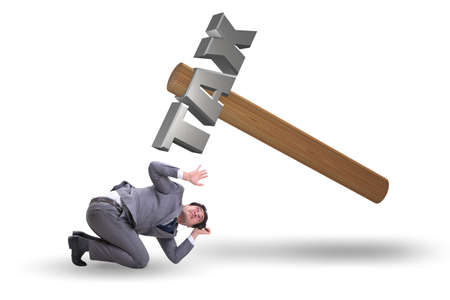 Businessman under the burden of tax paymentsの写真素材