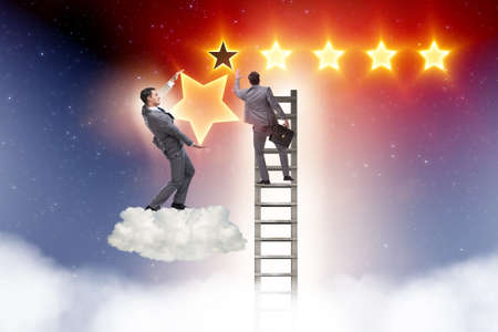 Businessman reaching out for stars