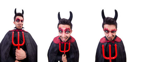 Man in devil costume in halloween conceptの写真素材