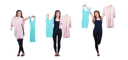 Woman trying new clothing on whiteの写真素材