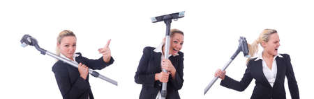 Businesswoman with vacuum cleaner on whiteの写真素材