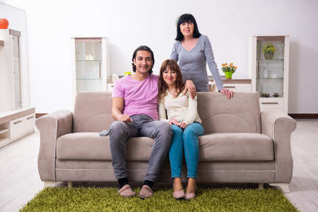 Young family and mother-in-law in family issues conceptの写真素材