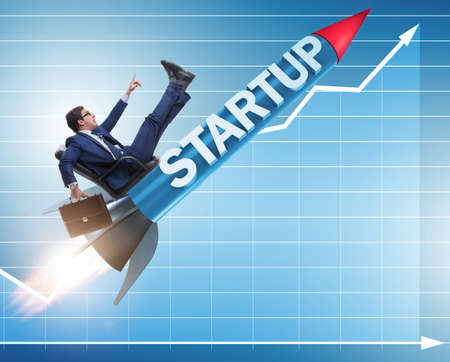 Businessman in start-up concept flying on rocket