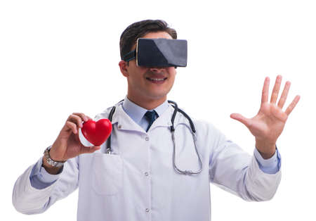 Doctor wearing a vr virtual reality headset isolated on white baの写真素材