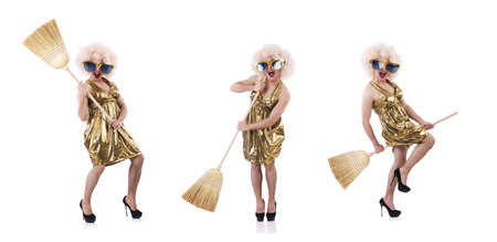 Funny witch with broom isolated on whiteの写真素材