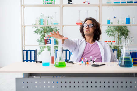 Funny male chemist working in the labの写真素材