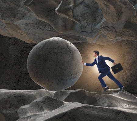 Businessman in difficult challenge conceptの写真素材