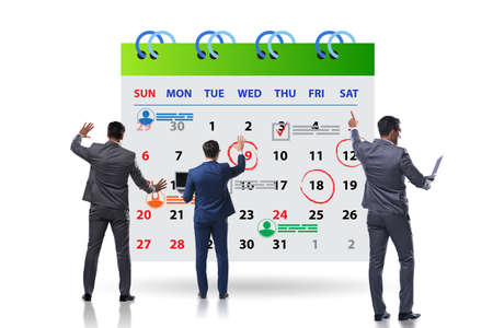 Business calendar concept with businessmanの写真素材