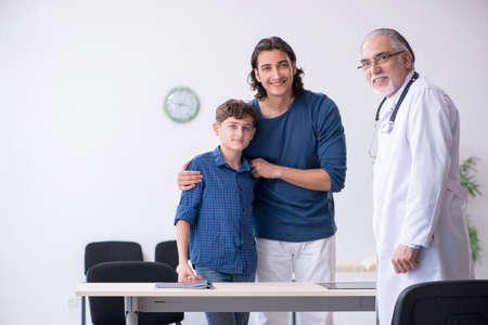 Young boy visiting doctor in hospitalの写真素材