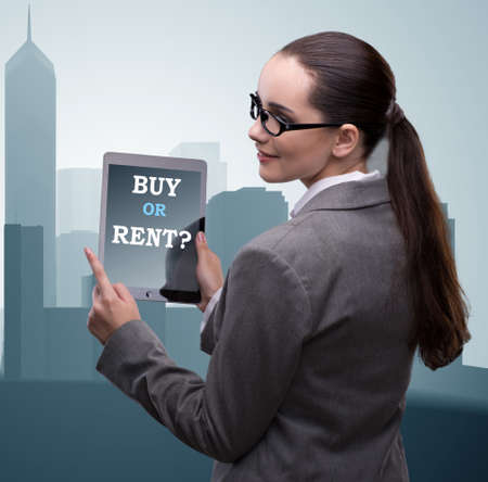 Businesswoman facing dilemma of buying versus rentingの写真素材