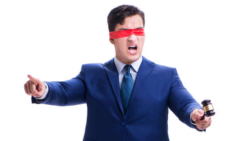 Lawyer with blindfold holding a gavel isolated on whiteの写真素材