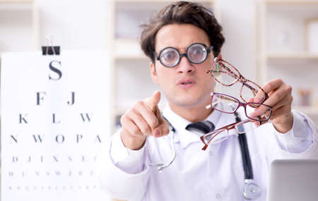 Funny eye doctor in humourous medical concept