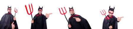 Man in devil costume in halloween conceptの写真素材