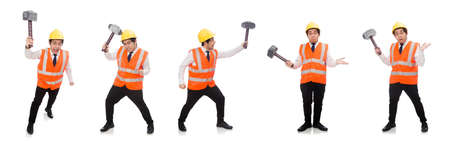 Construction worker with hammer isolated on whiteの写真素材