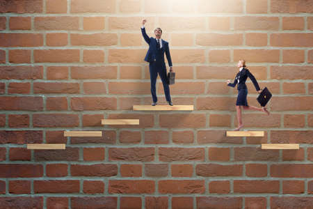 Gender discrimination concept with promotionsの写真素材