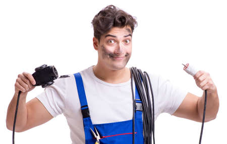 Funny man doing electrical repairの写真素材