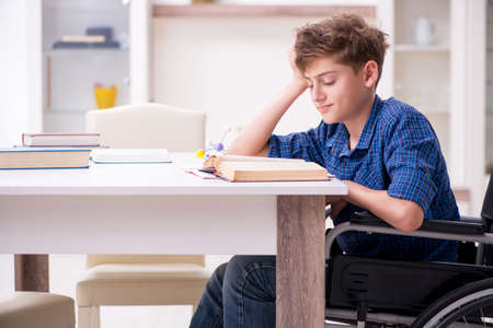 Disabled kid preparing for school at homeの写真素材